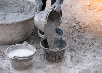 Fototapeta premium mixer and bucket of cement