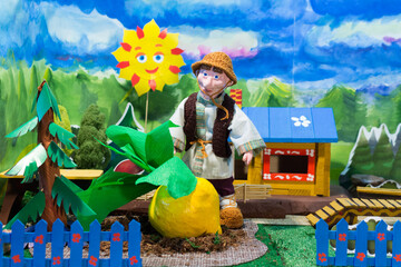 Home puppet theatre. Oldman and turnip. Russian fairytale.
