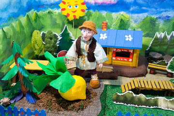 Home puppet theatre. Oldman and turnip. Russian fairytale.
