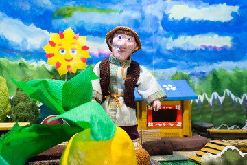 Home puppet theatre. Oldman and turnip. Russian fairytale.
