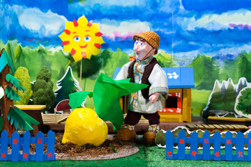 Home puppet theatre. Oldman and turnip. Russian fairytale.

