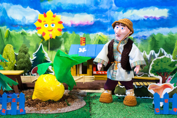 Home puppet theatre. Oldman and turnip. Russian fairytale.
