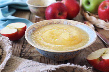 Healthy organic applesauce in ceramic bowl