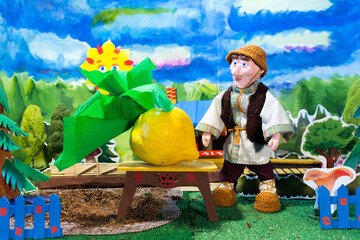Home puppet theatre. Oldman and turnip. Russian fairytale.
