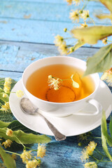 Cup of herbal linder tea with linden flowers