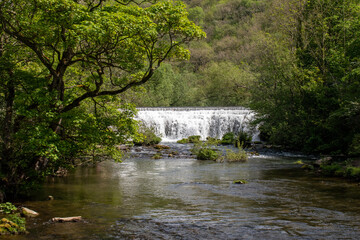 Fototapeta premium Monsal Dale Weir waterfall in Derbyshire, UK