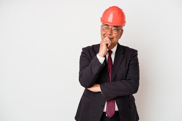Senior american arquitech man isolated on white background relaxed thinking about something looking at a copy space.