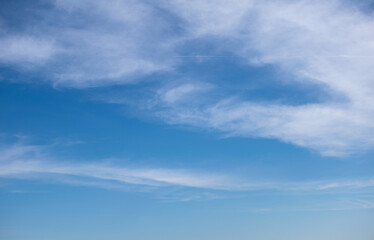 Naklejka na ściany i meble Background. Blue sky with air clouds.