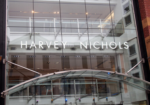 leeds, west yorkshire, united kingdom - 7 july 2021: sign and windows above the front entrance of harvey nichols department store on briggate in leeds