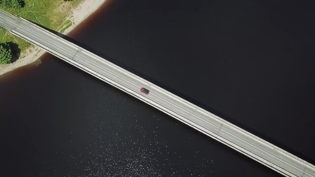 Aerial View of Red Car Driving Across Baltyboys Bridge, Blessington