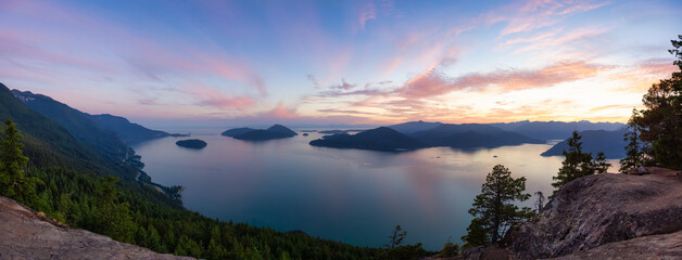 Fototapeta na wymiar Tunnel Bluffs Hike, in Howe Sound, North of Vancouver, British Columbia, Canada. Panoramic Canadian Mountain Landscape View from the Peak during sunny summer sunset.