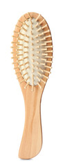 Bamboo hairbrush isolated on white. Conscious consumption