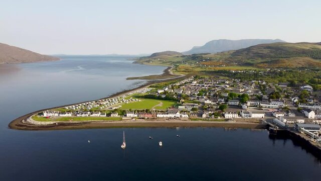 4k drone footage of the seafront at Ullapool in the Western Highlands of Scotland, UK