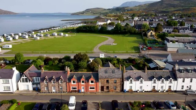 4k drone footage of the seafront at Ullapool in the Western Highlands of Scotland, UK
