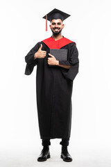 Asian Graduate man in cap and gown smile Celebrating showing thumbs up with Confident emotional so proud and happiness in Graduation day isolated on white Background