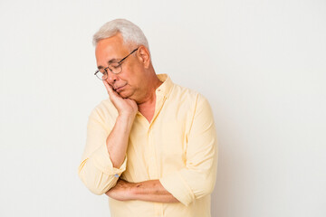 Senior american man isolated on white background who is bored, fatigued and need a relax day.