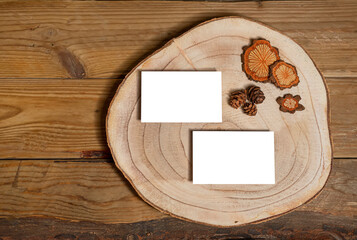 Fototapeta na wymiar Real photo of business card ,cross section of the tree with rustic wood background.