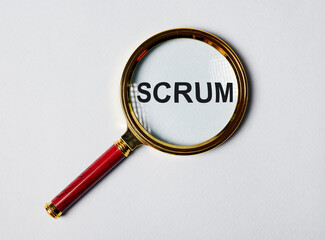 Scrum word through magnifying glass. Concept of methods in management