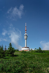 Television transmitter tower with observation platform on the peak of Praded,Jeseniky mountains,Czech republic.Views of picturesque countryside,popular tourist place for hiking and leisure.