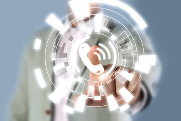 Hotline service. Man pointing at virtual icon with telephone symbol, closeup