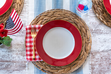 Overhead view of red white and blue picnic place setting
