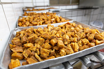Torresmo. Fried pork belly. Traditional Brazilian food at Feijoada.