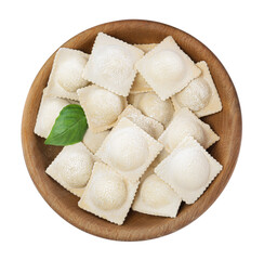 Fototapeta na wymiar Uncooked ravioli and basil in wooden bowl on white background, top view