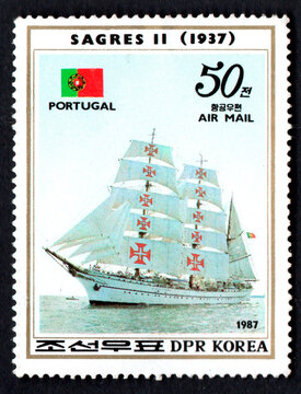 Korean postage stamp old sailing ship. Portuguese sailing ship Sagres II on sea