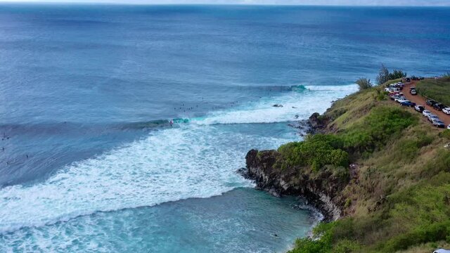 4K drone video tropical travel adventure surfing at a beautiful beach with huge waves