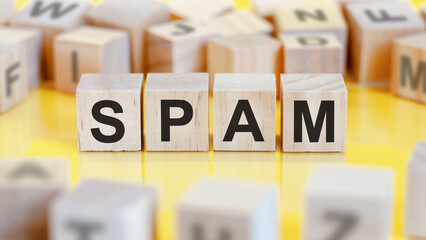 word spam written on wood blocks, concept.