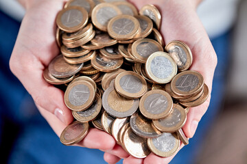 euro coins in the hand