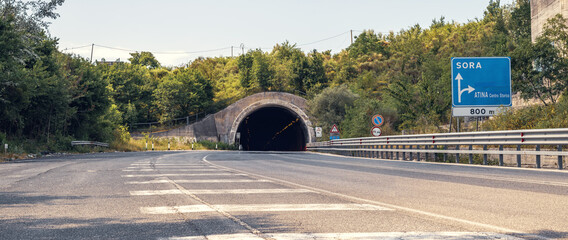 tunnel road along the Sora-Cassino road near Atina town in the Italian Lazio region - obrazy, fototapety, plakaty