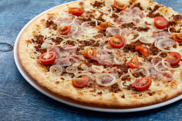 pizza on the wooden background