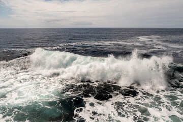 Powerful wave at the coast of Inishmore, Aran Islands, County Galway, Ireland. Irish landscape