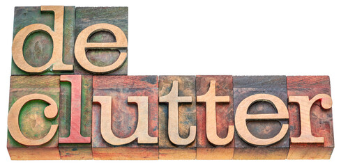declutter - isolated word abstract in vintage letterpress wood type stained by color inks, minimalism, business and lifestyle concept
