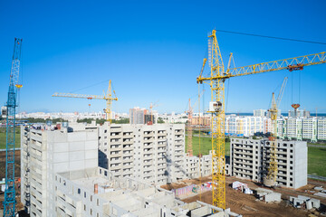 Mass construction of the district with panel multi-storey buildings. Shooting from a drone.
