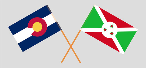 Crossed flags of The State of Colorado and Burundi. Official colors. Correct proportion