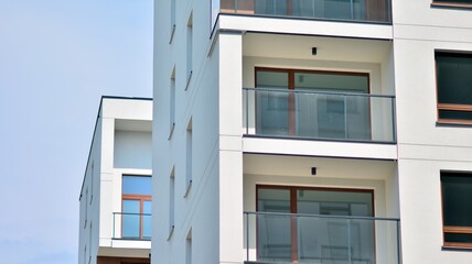 Eco architecture. Green tree and apartment building. The harmony of nature and modernity.