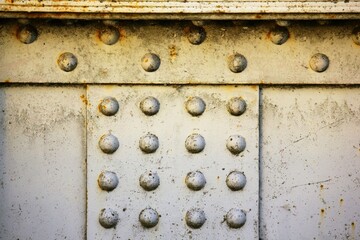 Close up of a rusty, iron bridge