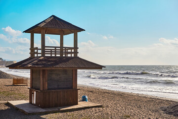 San Pedro Alcantara beach in Marbella. Very sunny day with a blue sky and a stall in front