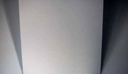 Abstract blank shadows on a white wall. Modern wall accents. White and gray background.