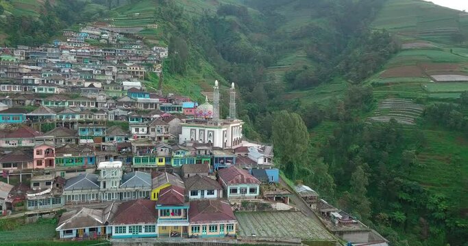 Drone view of Butuh Village Nepal Van Java in slope of the Sumbing Mountain, Magelang, Central Java in the morning in clear condition weather. Perfect for travel, cinematic, promotion and documentarie