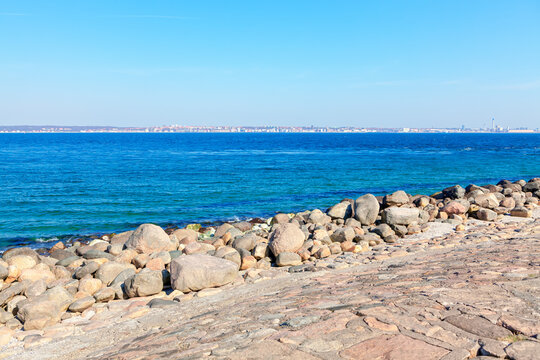 Cobblestone dam . View of Sweden from Denmark . Niva Bugt Bay in Scandinavia