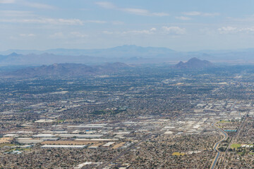 Aerial View of a near mountain range in skyline Phoenix, Arizona