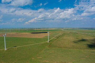 Wind turbine power farm in Texas USA with rows of many windmill renewable energy
