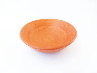 Brown terracotta saucer on white background.