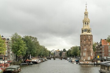 The Montelbaanstoren is a tower on the shore of the Oudeschans, Amsterdam canal in the Netherlands. 