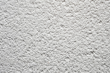 White porous plasterer concrete surface texture background. Stucco finishing wall facade closeup