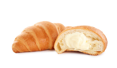 Delicious croissants with cream on white background