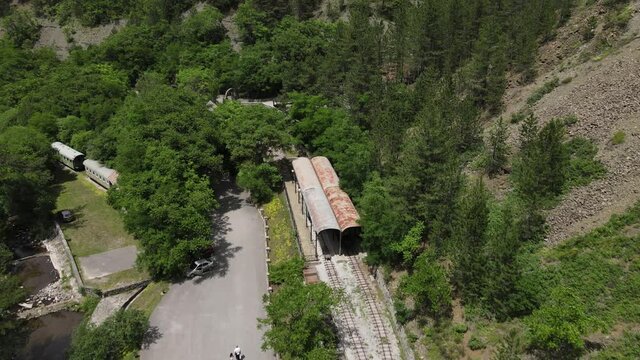 Aerial View of Sargan Eight Train Station, Mokra Gora, Serbia. Old Narrow Gauge Railway, Now Tourist Attraction, on Sunny Summer Day